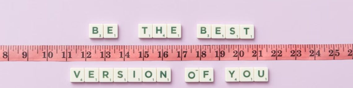Motivational phrase 'Be the Best Version of You' with a measuring tape on purple background.